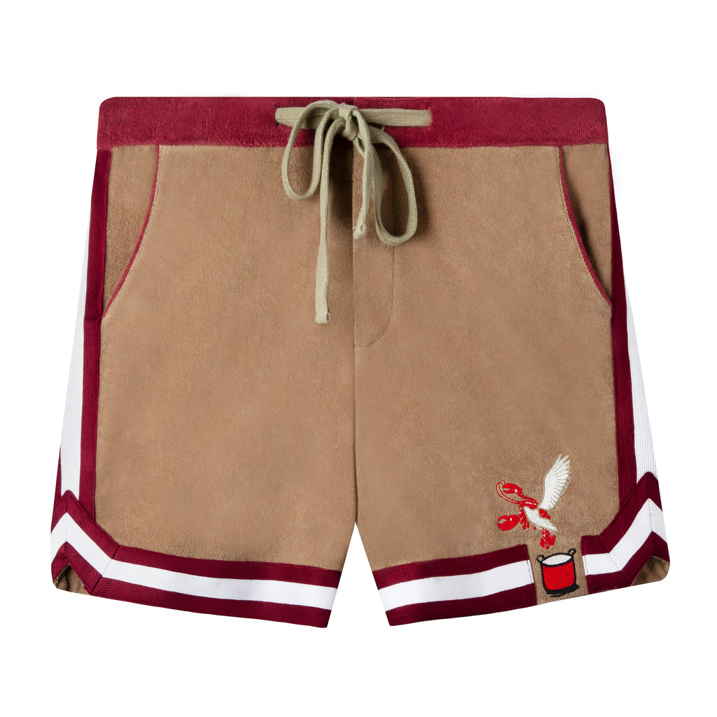 front lay flat product photo of shorts showing brown fabric with contrasting maroon and white short stripes on the seams and bottom hem along with a lobster flying out of a pot applique in bottom right corner