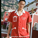 male model in the full matching set in front of buildings