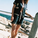 Female model in the full vongole set at the beach