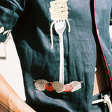 Close up of the embroidered fork with spaghetti
