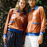 male and female models posing together in disco fungi cabana