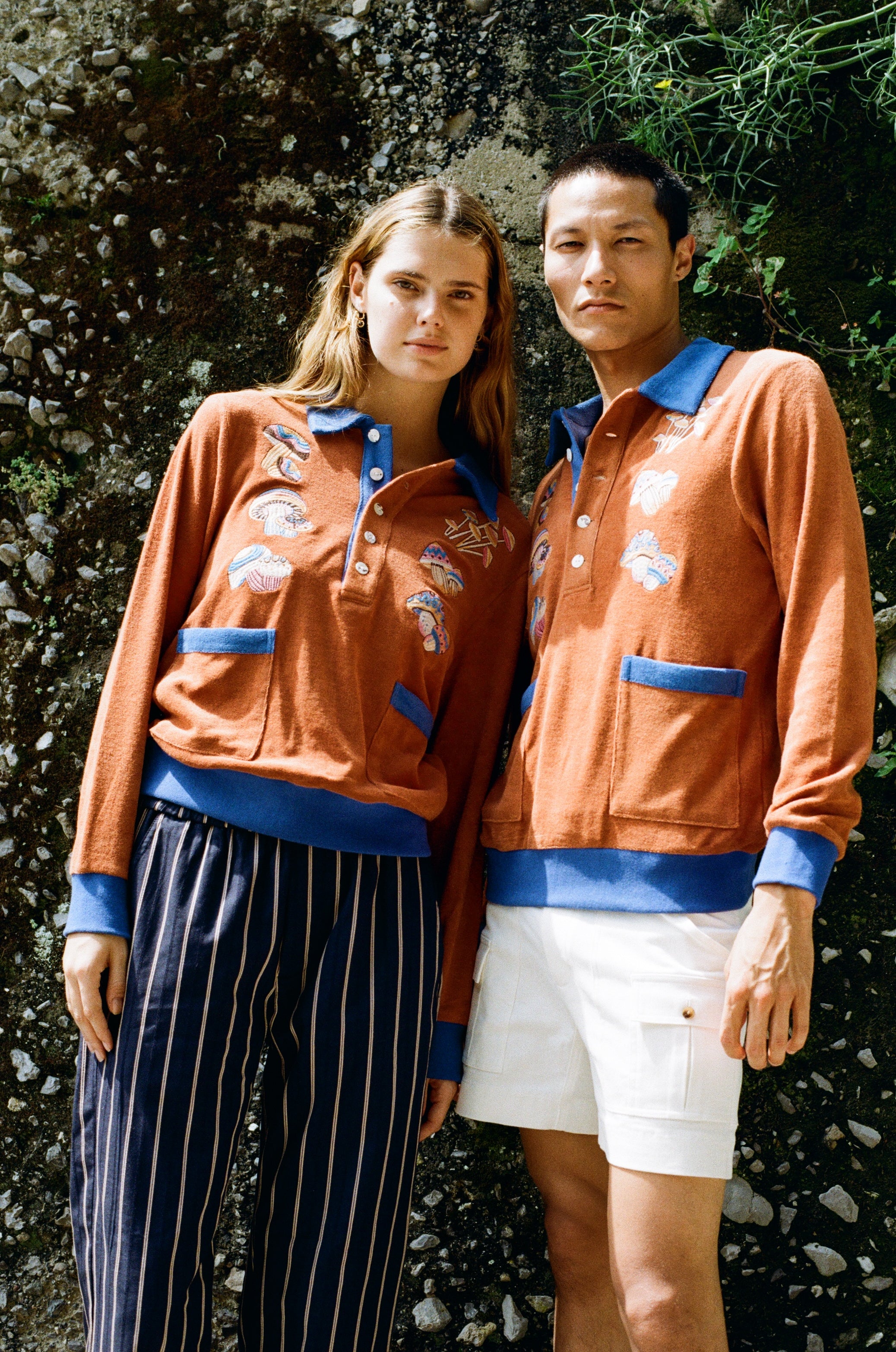 male and female models posing together in disco fungi cabana