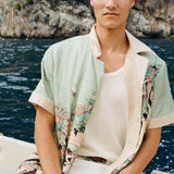 Man wearing unbuttoned Liguori shirt with collar popped