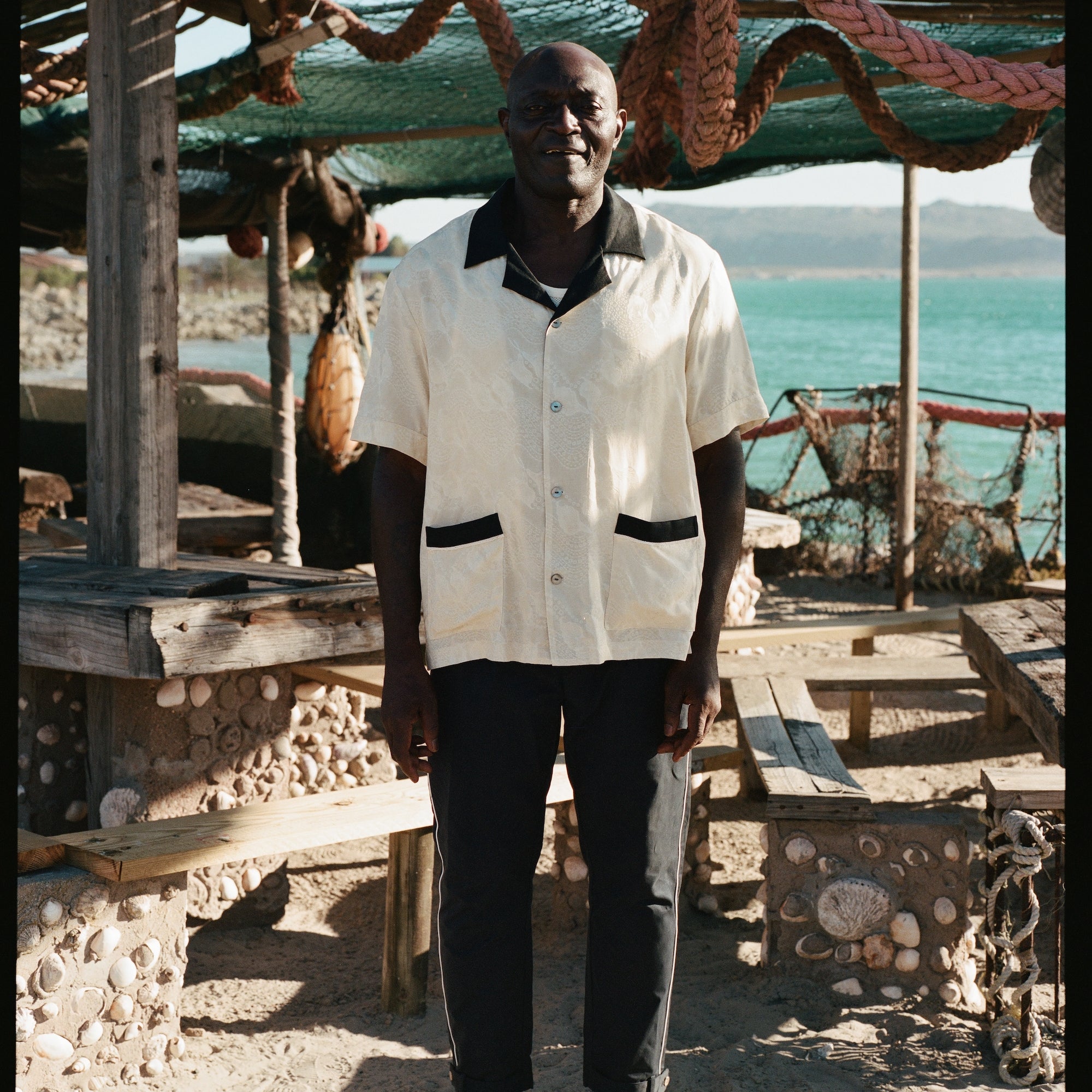 Older male model wearing the cabana with the navy traveler pants