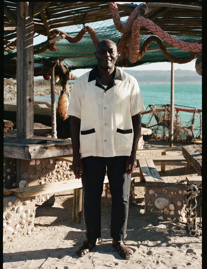 Older male model wearing the cabana with the navy traveler pants