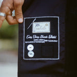 Close-up of the interior care label inside the Easy-Going Tuxedo Jacket.