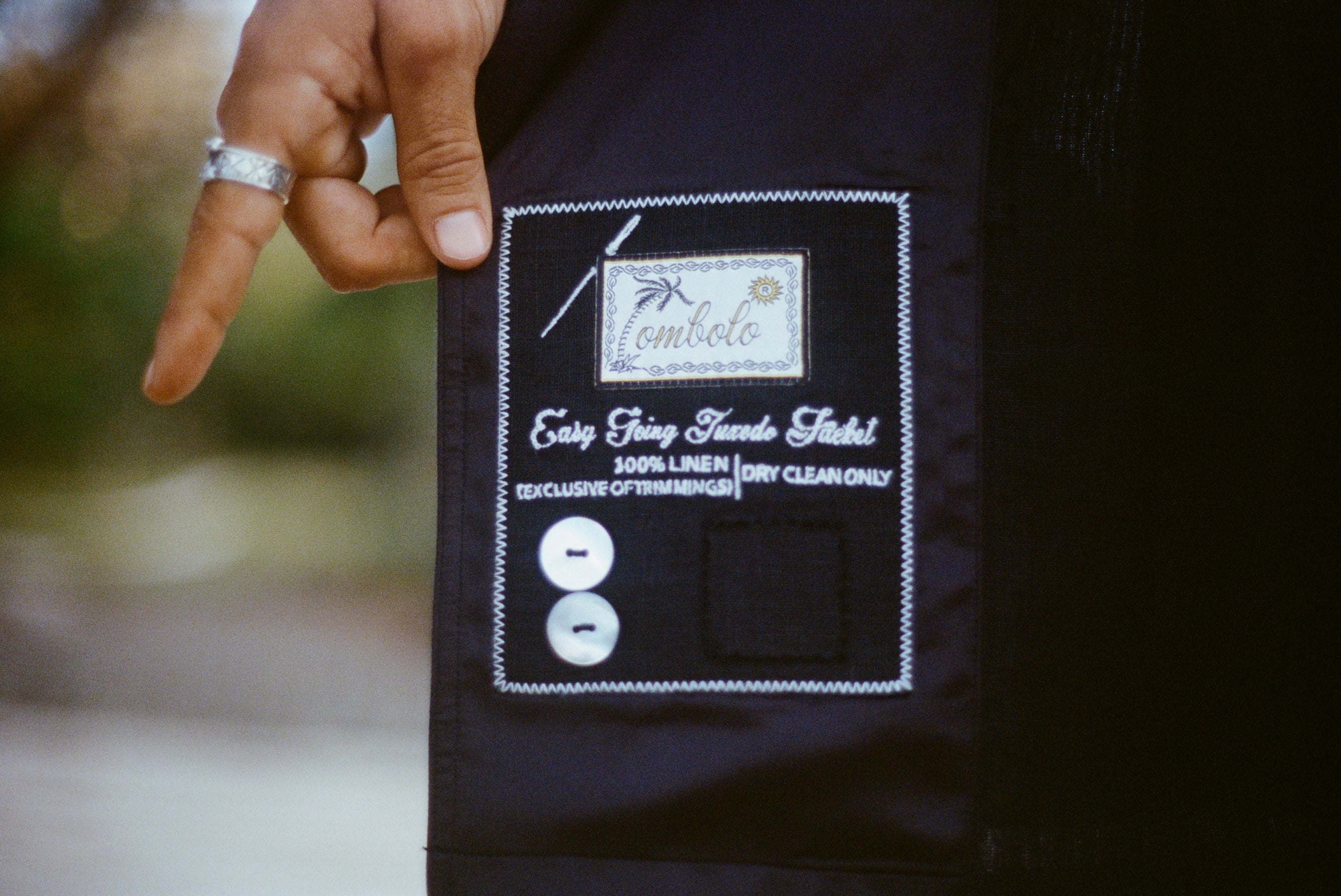 Close-up of the interior care label inside the Easy-Going Tuxedo Jacket.