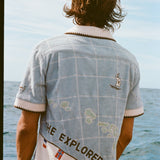 Male Model with long hang is showing off the backside of 'The Explorers Club' Expedition Cabana