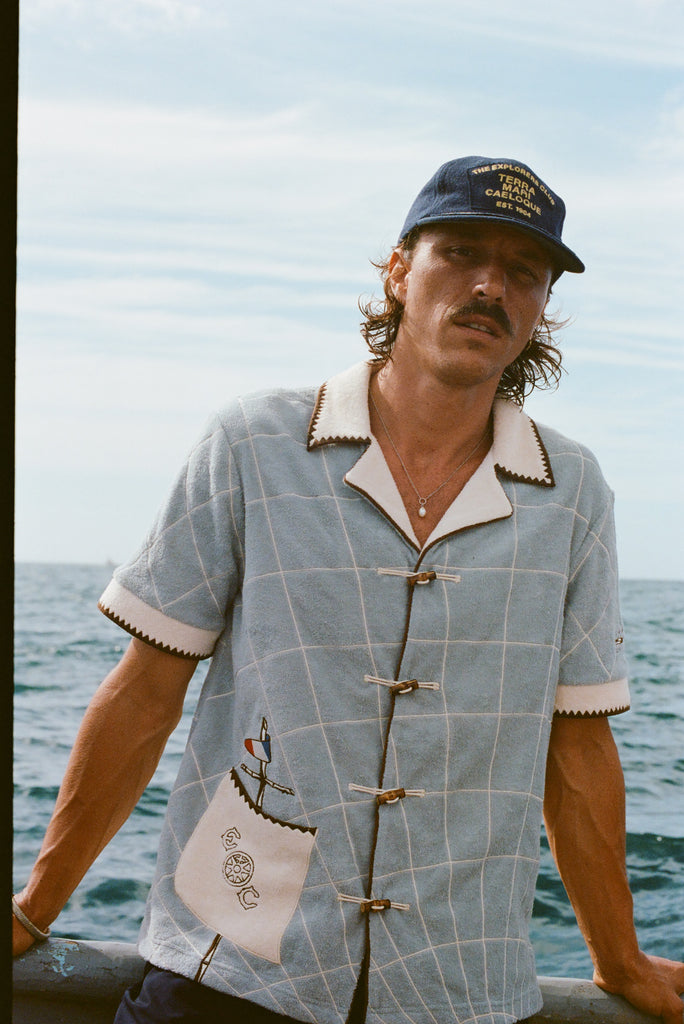 Male Model wearing 'The Explorers Club' Expedition Cabana with 'The Explorers Club' 6-Panel Souvenir Cap (Wool)