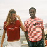 Two people wearing Le Sirenuse terry cloth t-shirts. 