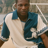 Man wearing blue and beige Late Checkout Cabana.