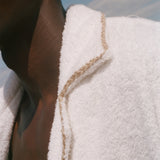 Close-up of the collar detail.