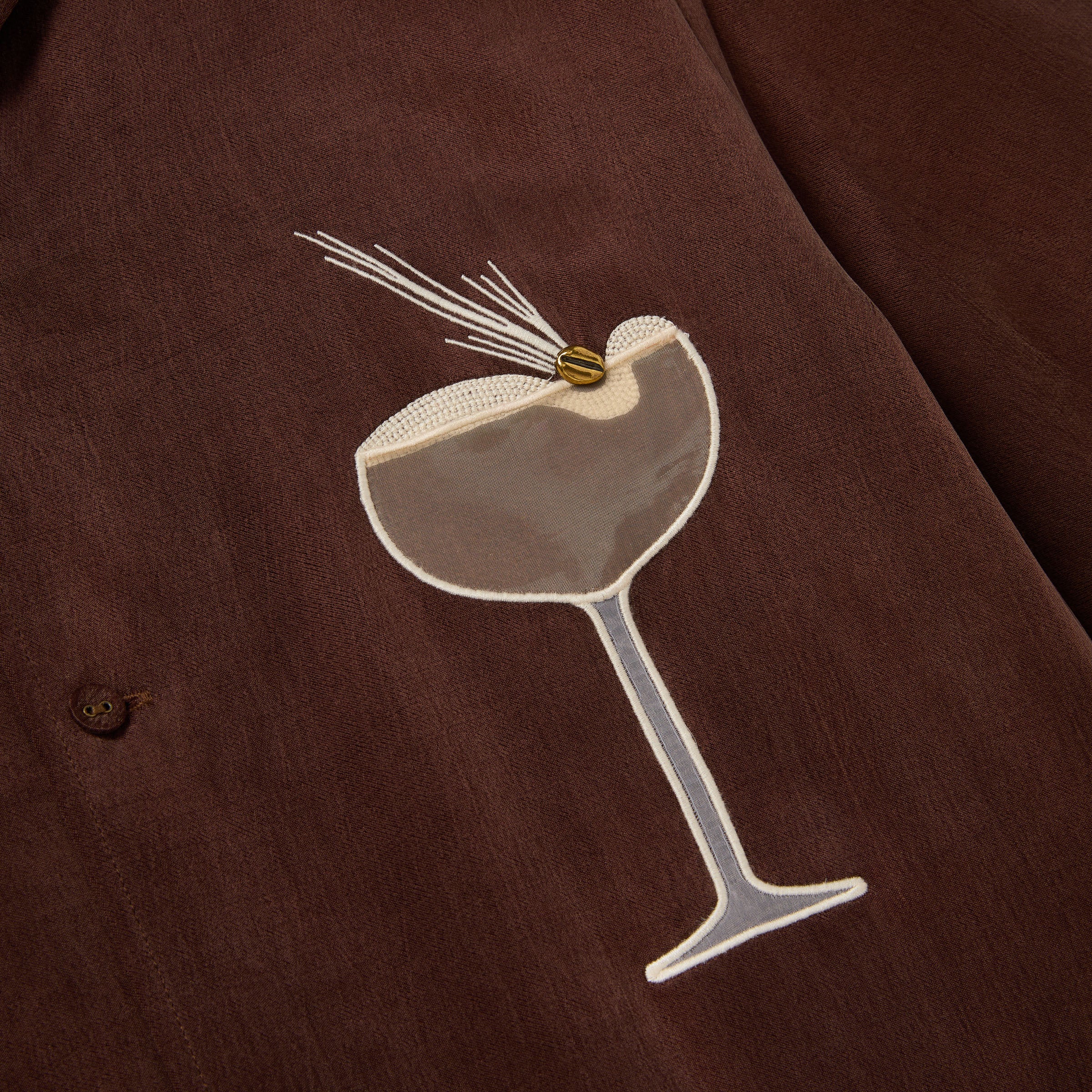 Close up of the Espresso Martini design on the cabana shirt.