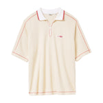 Beige polo shirt with red accents on a white background