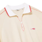 Beige polo shirt with white collar and red accents on a white background