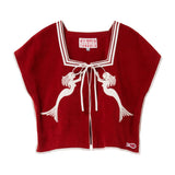 Red top with white trim and mermaid design on a white background