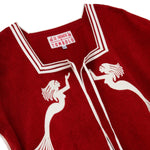 Close-up of interior Le Sirenuse x Tombolo label. 