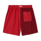 Back of red swim trunks. 