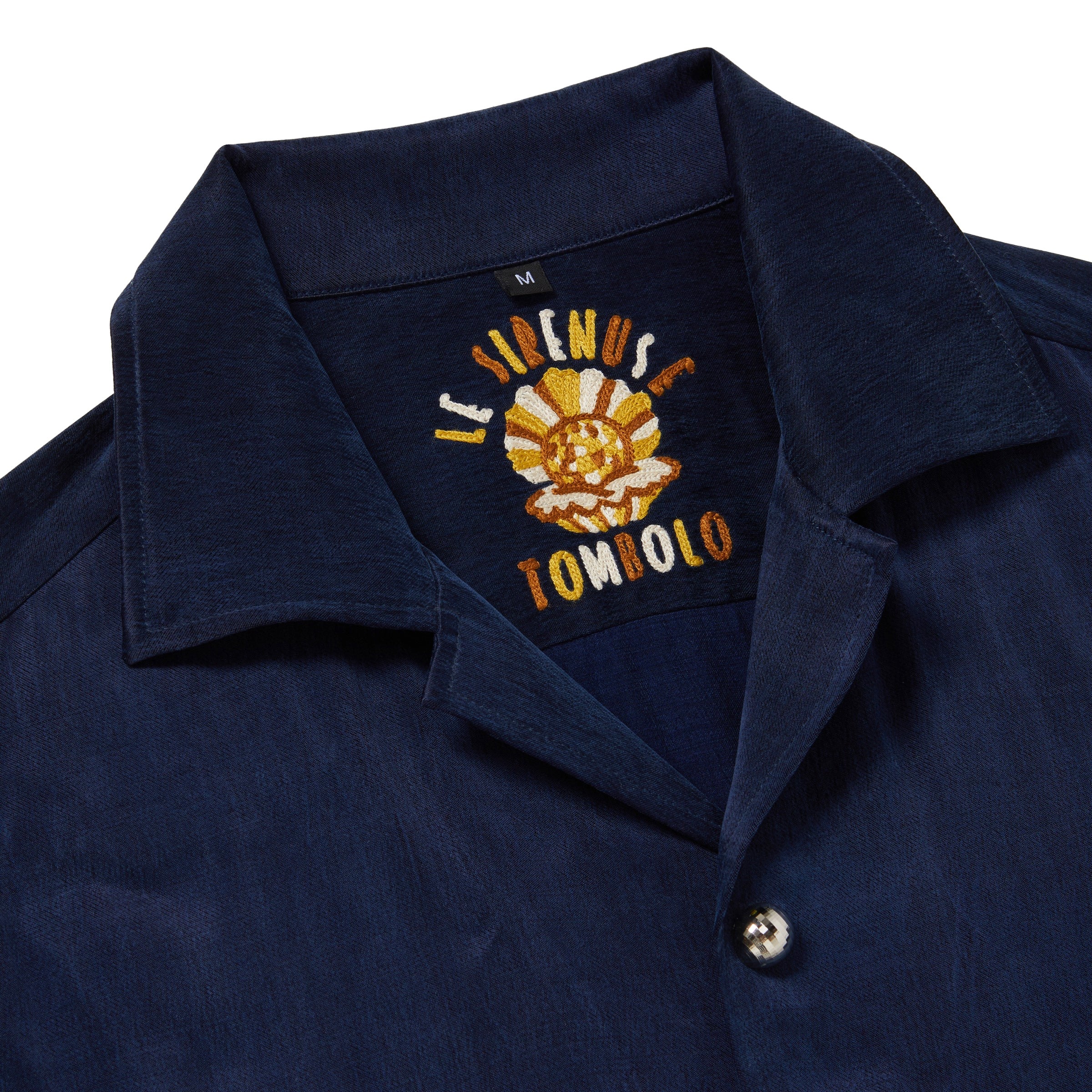 Close-up of interior Le Sirenuse x Tombolo label. 