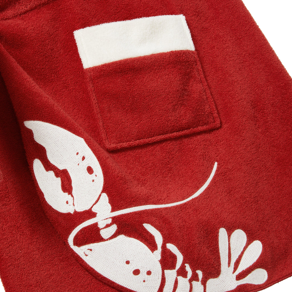 close up of pocket on red tie wrap skirt