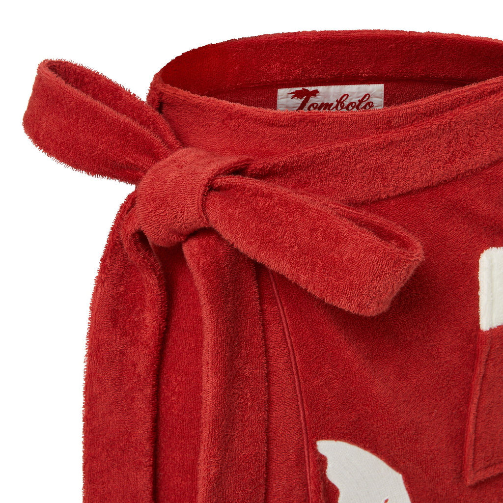 close up of tied wrap closure on red Tombolo wrap skirt