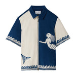 Blue and white zip-up shirt with mermaid design on a white background