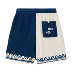 Backside of blue and beige cabana shorts. 