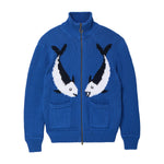 Blue zip-front knit sweater featuring two mirrored fish motifs and front patch pockets.