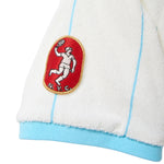 Cuff of Una Pizza Jersey with red pizza patch. 