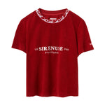 Red t-shirt with white 'Le Sirenuse' text on a white background