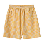 Yellow checkered shorts on a white background