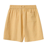 Yellow checkered shorts on a white background