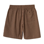Brown checkered shorts on a white background