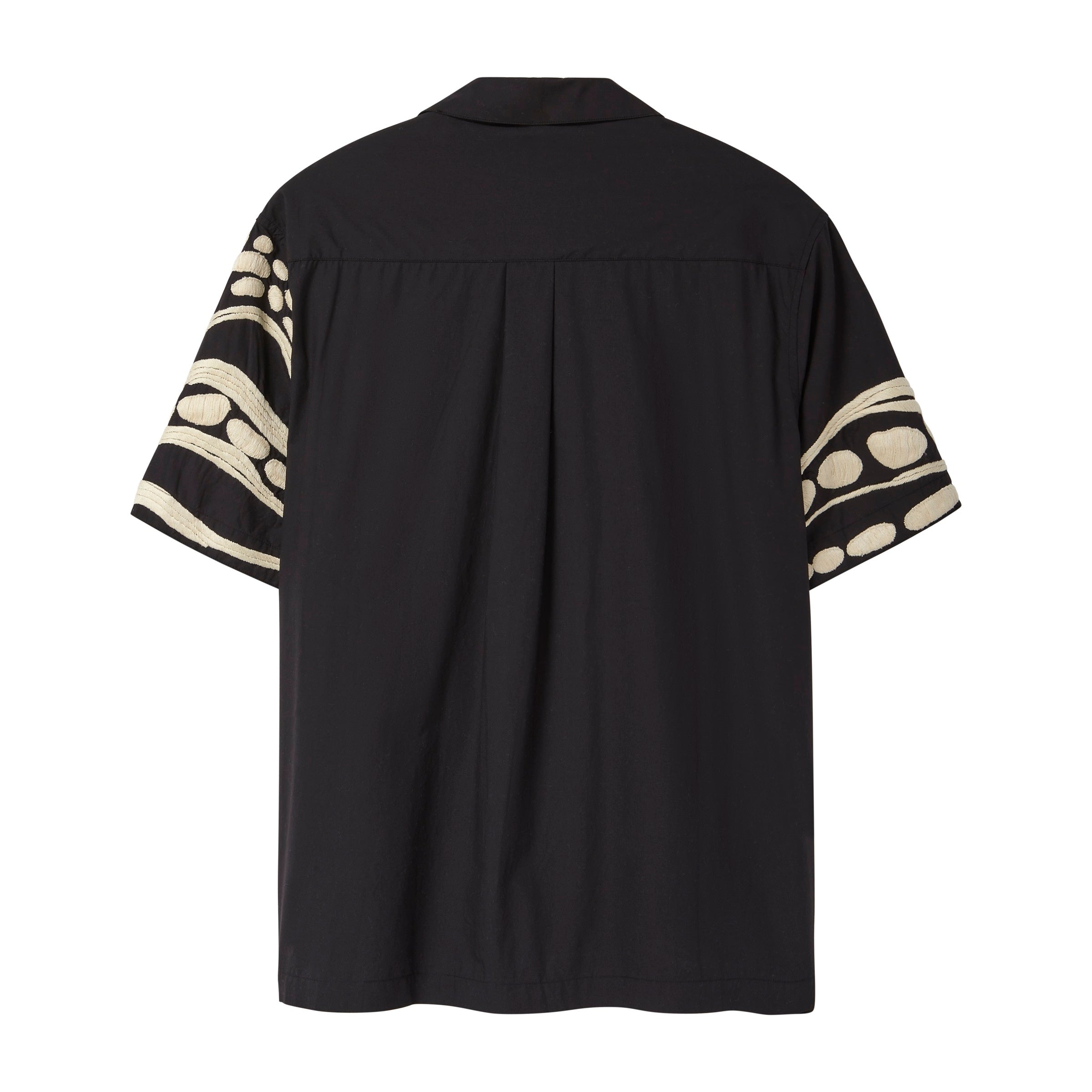 Back of black short sleeve cabana shirt with cream chain-stitch embroidery along the sleeves.