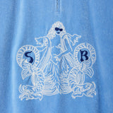 Blue shirt with white mermaid design and 'SR' initials on a blue background