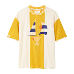 Yellow and white shirt with graphic design on a white background