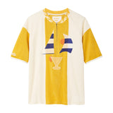 Yellow and white shirt with graphic design on a white background