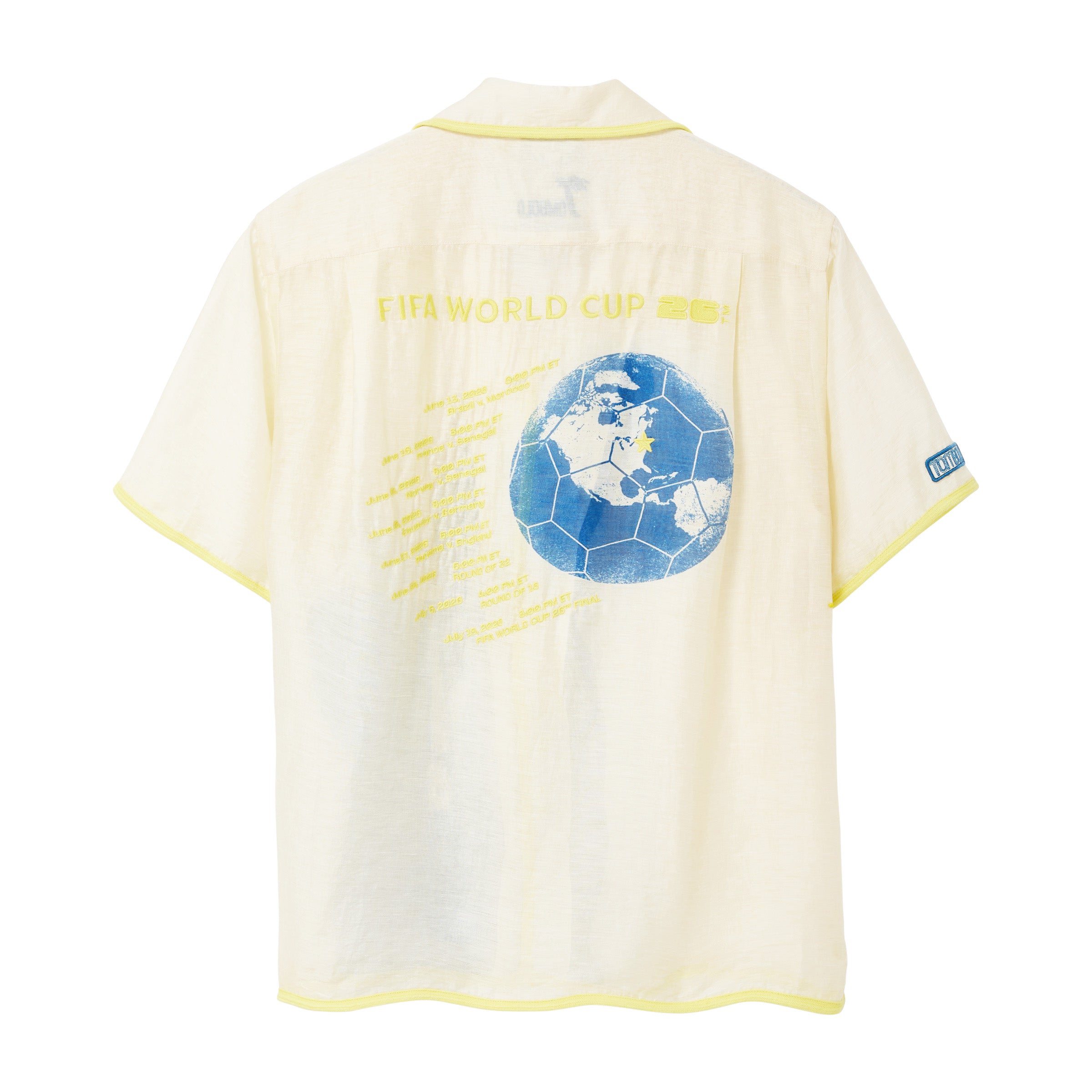 Back of cream camp collar shirt with yellow contrast trim, a blue globe graphic, and match details embroidered in yellow.