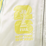 Embroidered FIFA logo on a white jacket with 'New York New Jersey' text.