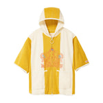 Yellow and white poncho with a brand logo on a white background