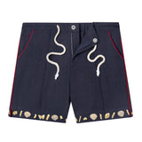 Unbuttoned and unzipped Navy linen Tombolo shorts with clams and pasta on white background