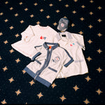 Image of all four 'Explorer's Club' x Tombolo items, featuring a Terry Tee, a Field Uniform, a TerryCloth Cabana and a Souvenir Cap.