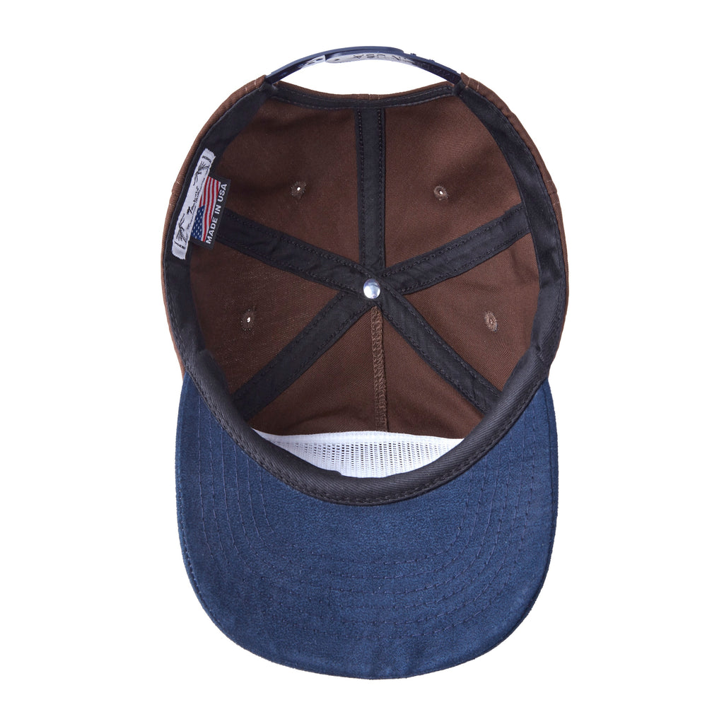 Image of the inside of the brown and blue hat. 