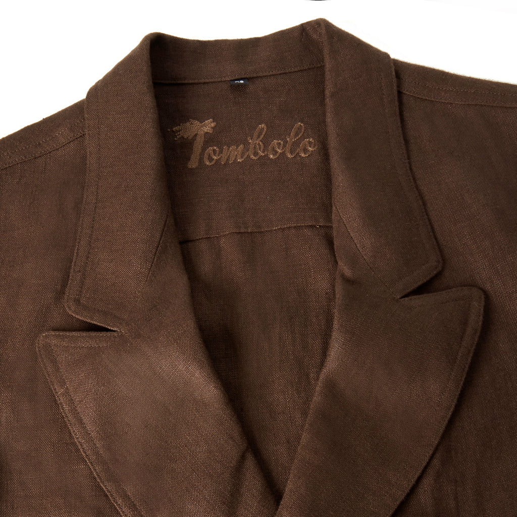 Close up image of the stitched Tombolo logo.