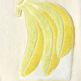 Close-up of the banana appliqué on the front pocket.