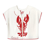 A customizable white hand towel top with a red lobster print and picot trim, featuring loop button closure at the sternum and hidden seams.