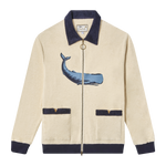 Full-zip long sleeve cabana shirt in beige with a contrast navy collar and cuffs featuring an embroidered whale on the front. 