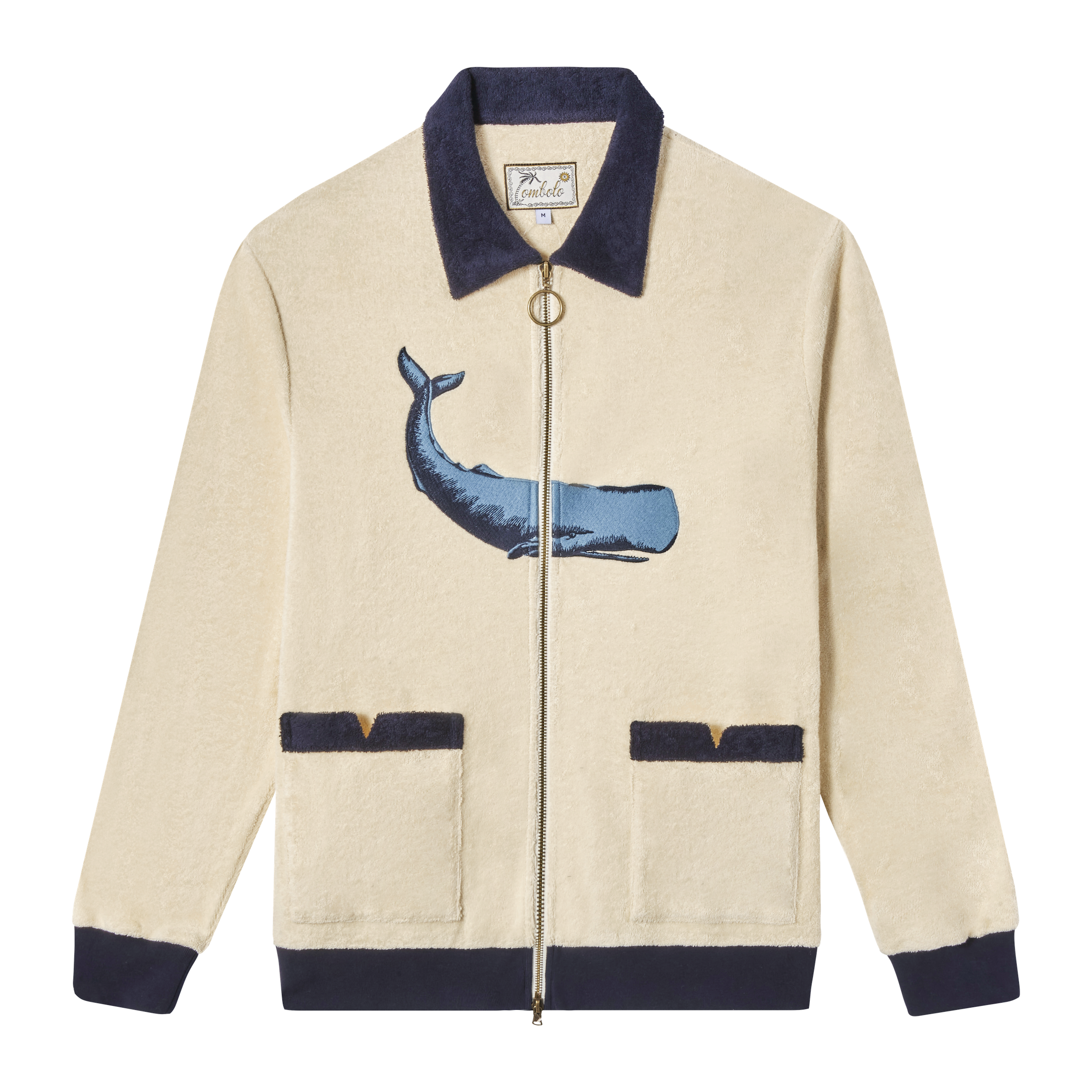 Full-zip long sleeve cabana shirt in beige with a contrast navy collar and cuffs featuring an embroidered whale on the front. 