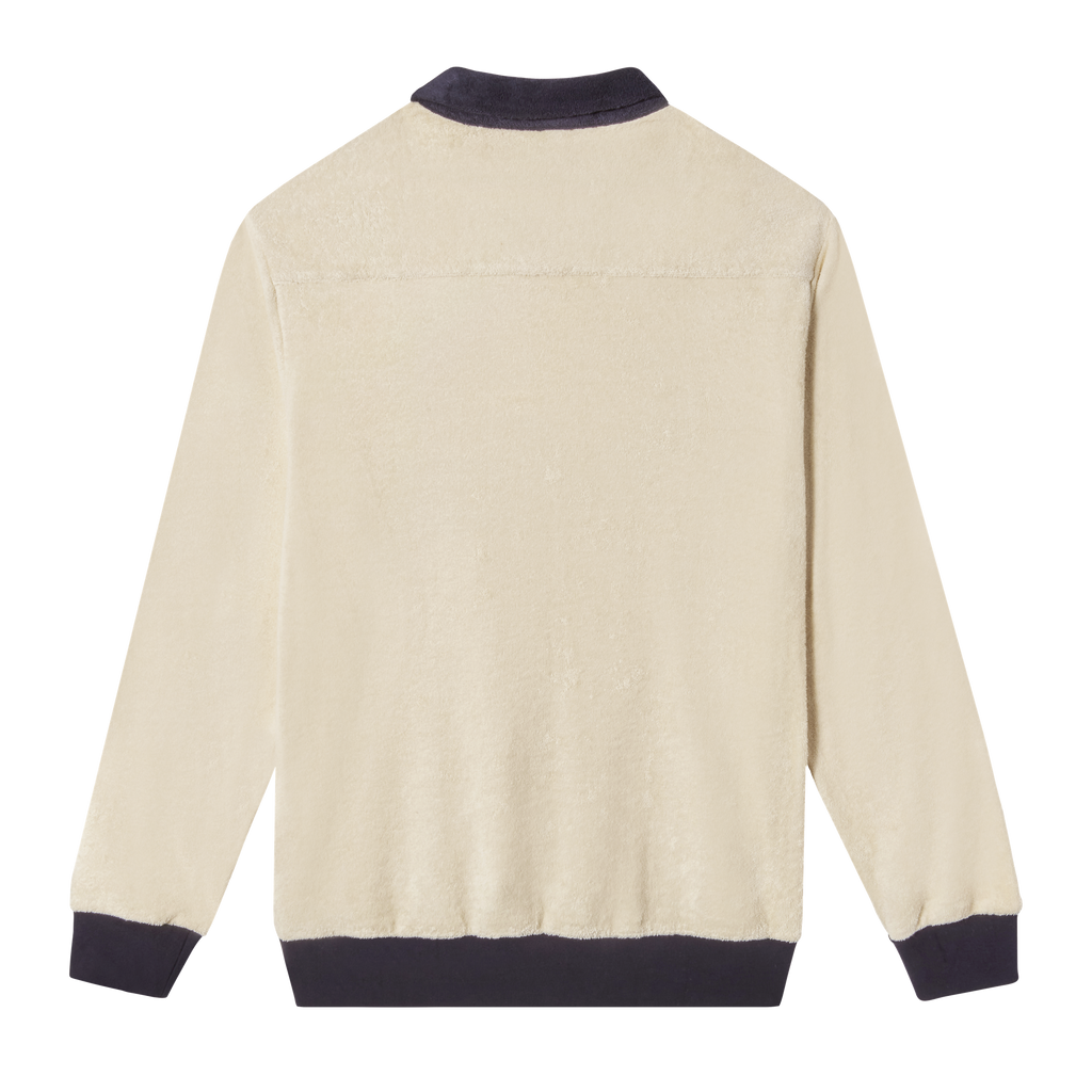 Backside of long-sleeve terry cloth 'Blubber' Cabana, featuring beige terry cloth with dark blue collar and cuffs. 