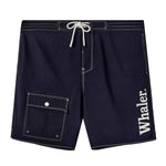 Navy board shorts with white contrast stitching and a white drawstring at the waist. Features a flap cargo pocket on the wearer’s right leg and white embroidered text reading 'Whaler' on the wearer’s left leg.
